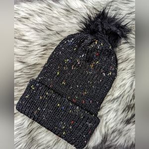 Handmade knitted pom pom hat